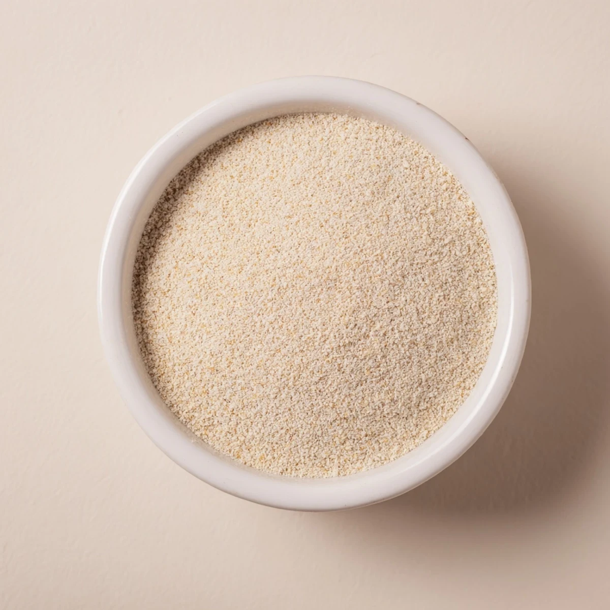 Vibrant image of fresh garlic cloves transformed into aromatic, easy-to-use garlic powder.