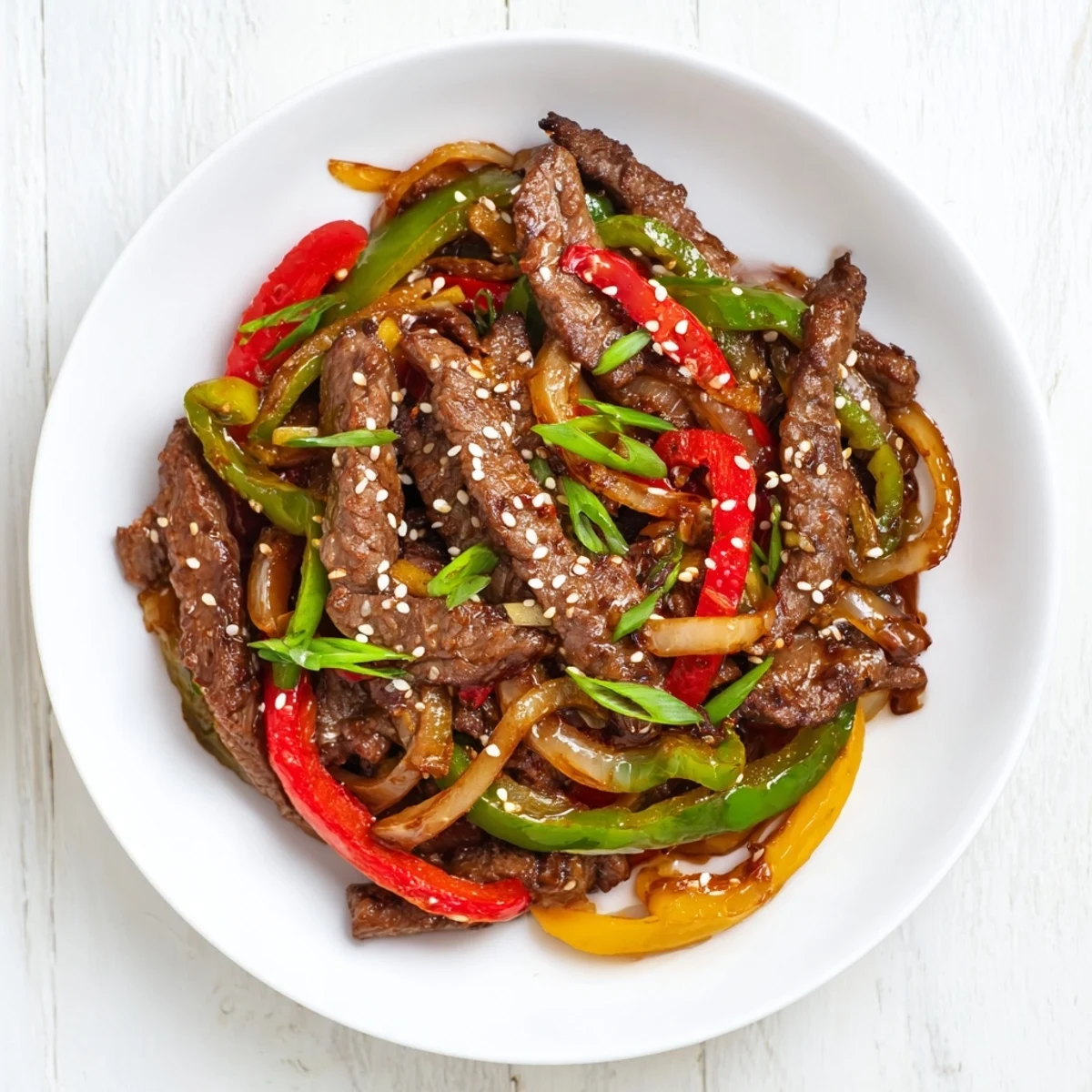 Here are the 3 ALT texts for the recipe "Spicy Beef and Pepper Stir Fry":