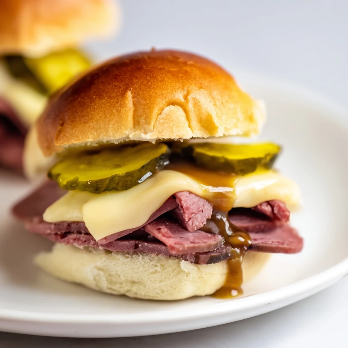 Sizzling Corned Beef Sliders with Mustard are pulled fresh from the oven for game day.